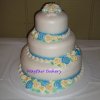 3 tier Cake Hope - 3 tiers with rounded edges to make it look like rolled fondant but it's iced in soft buttercream.Each tier is offset/stepped back. 6", 9", 12" tiers. 12+ pounds. Serves 60 to 75.